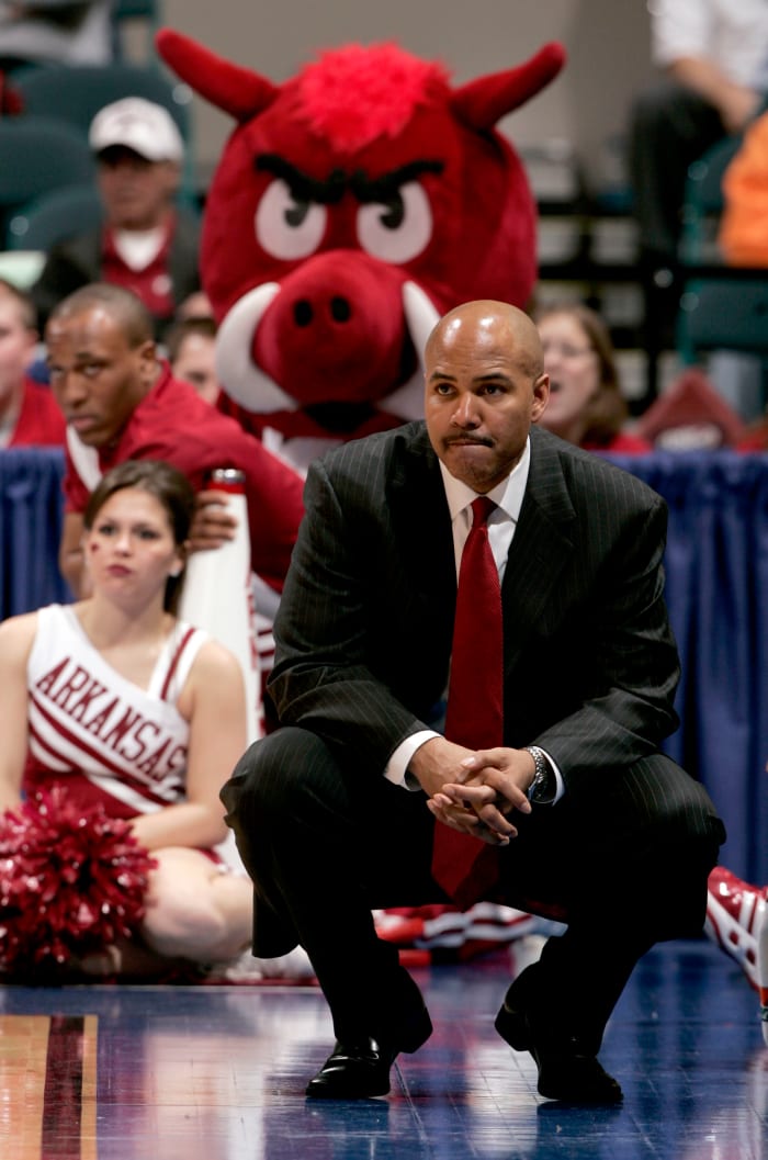 Arkansas Razorbacks head coach Stan Heath watches from the sidelines during the second half of a quarterfinal round SEC Tournament game against the Vanderbilt Commodores at the Georgia Dome in Atlanta.